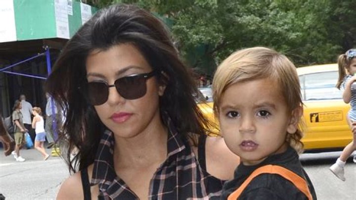 Kourtney Kardashian & Travis Barker Take Her Kids Mason, Penelope, and Reign Disick To Disneyland