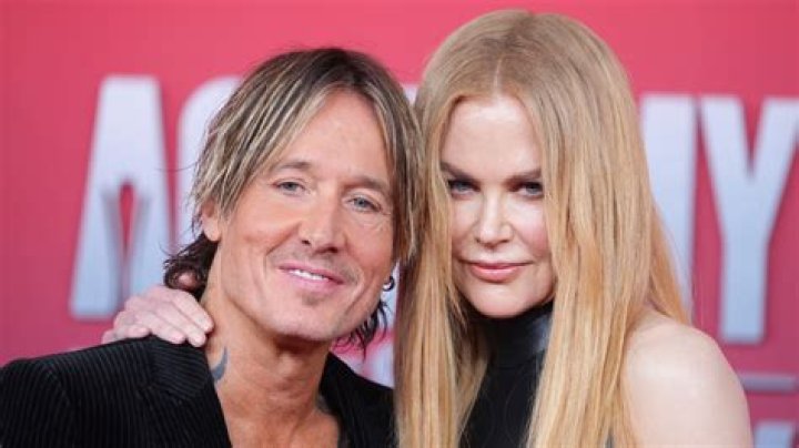 Nicole Kidman & Keith Urban Share Passionate Kiss In Paris After She Walks The Runway